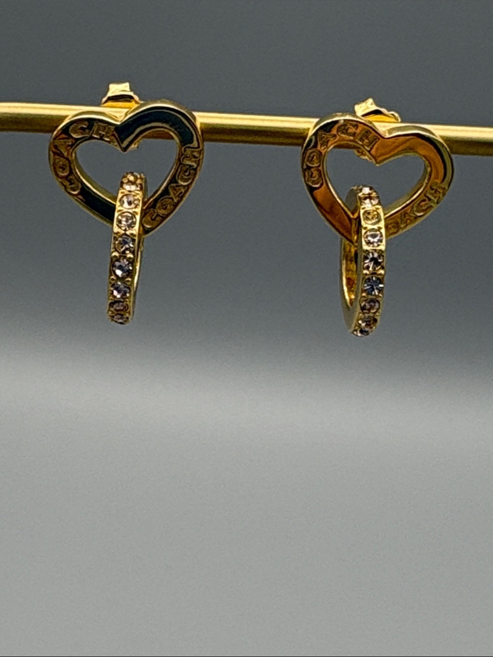 Coach Gold Tone Heart Hoop Earrings with Crystal Accents